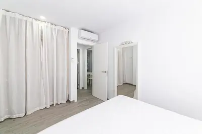 Cama o camas de una habitación en Apartamentos “Mar de Coral” Aguadulce