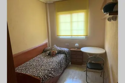 Cama o camas de una habitación en Apartamento 3 dormitorios en la playa de Almeria.