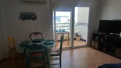 Una televisión o centro de entretenimiento en Las Negras, WIFI con vistas al mar, 3º con Ascensor y AA