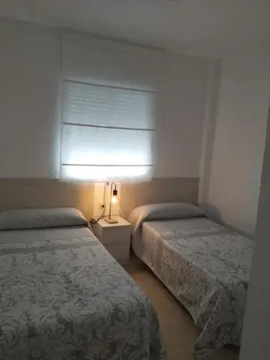 Cama o camas de una habitación en Alojamiento las Dunas