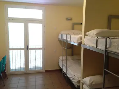 Cama o camas de una habitación en Albergue De Puntas De Calnegre