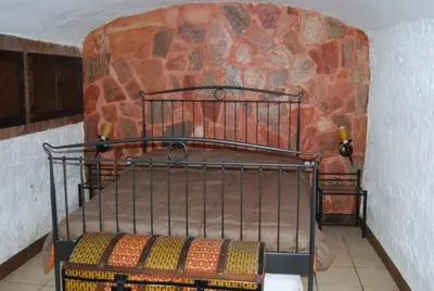 Cama o camas de una habitación en Cueva El Haro
