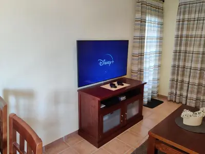 Una televisión o centro de entretenimiento en Casa Bavera