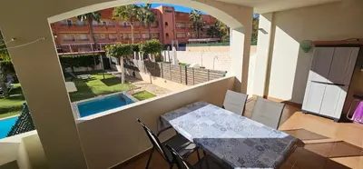 Piscina en o cerca de Homes of Spain, Apartamentos Paraíso Vera Playa, Ed Fatu Hiva Bajo con PISCINA PRIVADA y jardín privado en PRIMERA LINEA de Vera Playa, WIFI