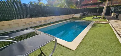 Piscina en o cerca de Homes of Spain, Apartamentos Paraíso Vera Playa, Ed Fatu Hiva Bajo con PISCINA PRIVADA y jardín privado en PRIMERA LINEA de Vera Playa, WIFI