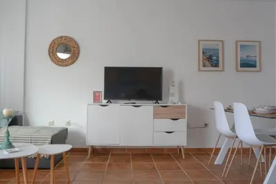 Una televisión o centro de entretenimiento en Casa Indalmar II San José