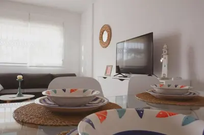 Una televisión o centro de entretenimiento en Casa Indalmar II San José