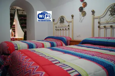 Cama o camas de una habitación en Cuevas de María