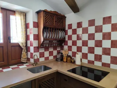 Una cocina o zona de cocina en Casa Cueva EL ZAGAL