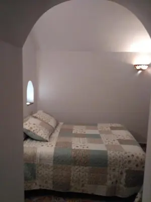 Cama o camas de una habitación en Casa Cueva EL ZAGAL