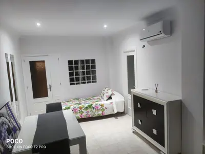 Cama o camas de una habitación en Apartamentos avda juan Carlos