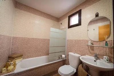 Un baño de Apartamento relajante con vistas al atardecer en Águilas