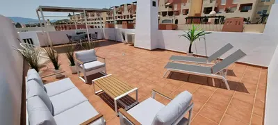 Un balcón o terraza de Homes of Spain, Apartamentos Paraíso Vera Playa, Ático Alborada con solárium grande privado, a pie de playa, WIFI