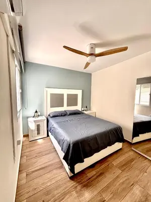 Cama o camas de una habitación en Apartamento a 1 MINUTO de la playa en GARRUCHA