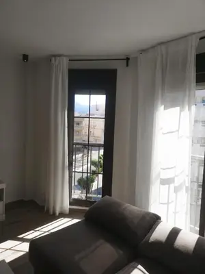 Zona de estar de Apartamento a 1 MINUTO de la playa en GARRUCHA