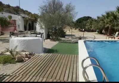 Piscina en o cerca de Cortijo casa rural 