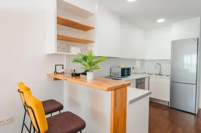 Una cocina o zona de cocina en Expoholidays- Primera linea de playa Palmeral