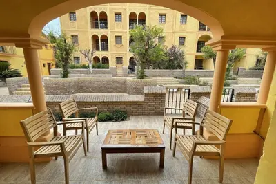 Un balcón o terraza de ELEGANTE DÚPLEX EN DESERT SPRINGS GOLF RESORT