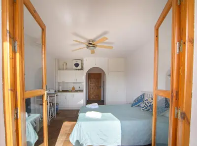 Cama o camas de una habitación en Natura Mediterranea estudio naturista primera linea con piscina