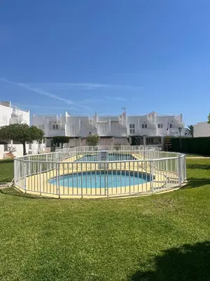 Piscina en o cerca de Duplex en urbanización con piscina comunitaria y wifi