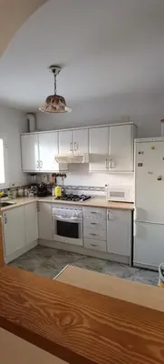 Una cocina o zona de cocina en Duplex en urbanización con piscina comunitaria y wifi