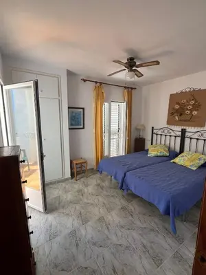 Cama o camas de una habitación en Duplex en urbanización con piscina comunitaria y wifi