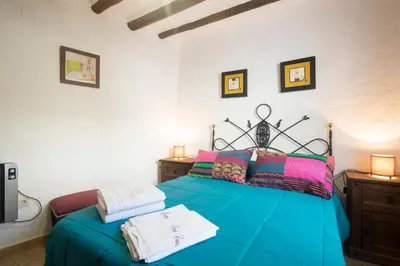 Cama o camas de una habitación en Charming House in Cádiar with View