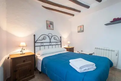 Cama o camas de una habitación en Charming House in Cádiar with View