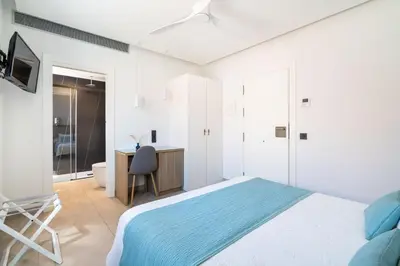 Cama o camas de una habitación en Hotel Cala Arena