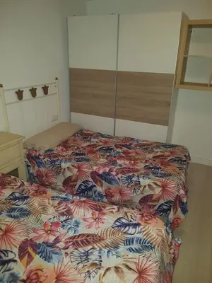 Cama o camas de una habitación en Piso de lujo en la playa de un pueblo de Granada con piscina infiniti, yacuzzi en la piscina, tumbonas privadas y mucho más
