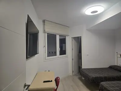 Zona de estar de Piso de lujo en la playa de un pueblo de Granada con piscina infiniti, yacuzzi en la piscina, tumbonas privadas y mucho más