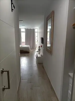 Cama o camas de una habitación en Estudio en la Urbanización de Roquetas de Mar