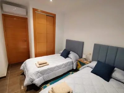 Cama o camas de una habitación en VeraTespera - Vera Playa WiFi, Piscina, Ocio Familiar