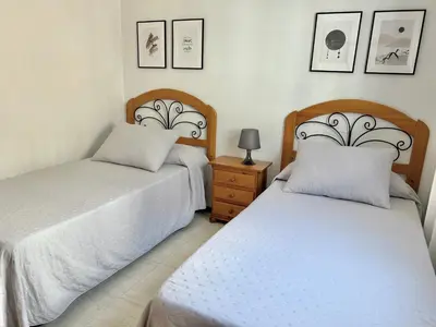 Cama o camas de una habitación en Panoramic Sea Views with Balcony, Air Conditioning and Parking