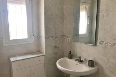 Un baño de Penthouse with large terrace and roof solarium, with amazing sea views