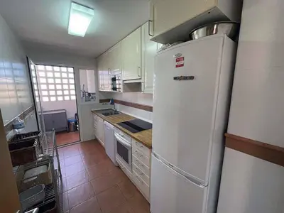 Una cocina o zona de cocina en Atico - 3 Dormitorios - Urbanizacion Verazul en Vera Playa - WIFI Fibra 300MB perfecto para Teletrabajo