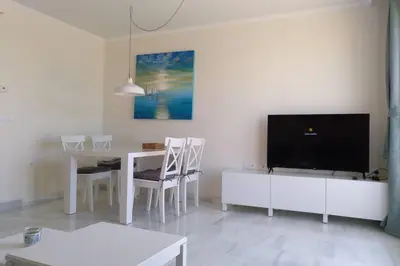 Una televisión o centro de entretenimiento en Playa Serena - Mar y Golf