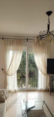 Una televisión o centro de entretenimiento en Apartamento en primera línea de playa, con vistas a la playa y con wifi