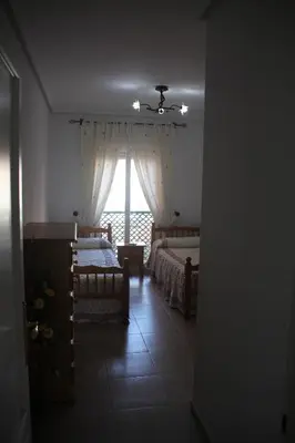 Cama o camas de una habitación en Apartamento en primera línea de playa, con vistas a la playa y con wifi