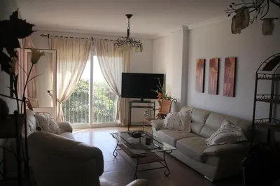 Una televisión o centro de entretenimiento en Apartamento en primera línea de playa, con vistas a la playa y con wifi