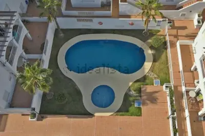 Piscina en o cerca de Apartamento-Solárium playa Marina de la Torre