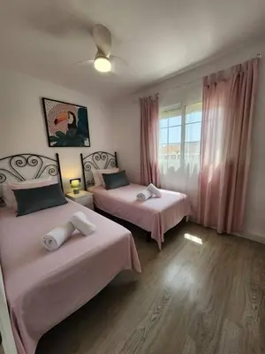 Cama o camas de una habitación en Apartamento Sol y Sur- Netflix y Parking Gratis