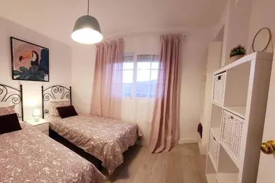 Cama o camas de una habitación en Apartamento Sol y Sur- Netflix y Parking Gratis