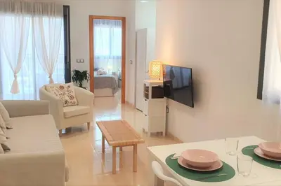 Zona de estar de Apartamento nuevo con piscina en la envía golf aguadulce Almería
