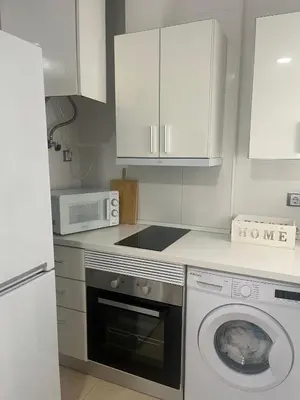 Una cocina o zona de cocina en Apartamento nuevo con piscina en la envía golf aguadulce Almería