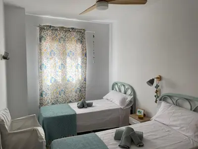 Cama o camas de una habitación en CASA MARITE
