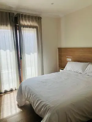 Cama o camas de una habitación en El Montoro