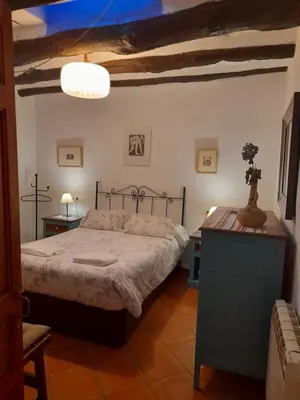 Cama o camas de una habitación en Casa-Huerto La Juana