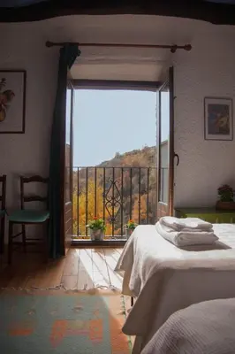 Cama o camas de una habitación en Casa-Huerto La Juana