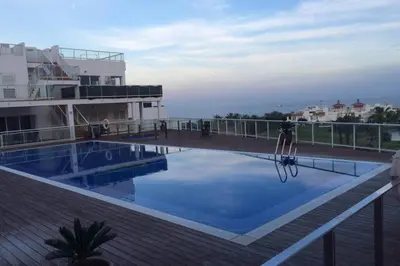 Piscina en o cerca de Bonito apartamento en primera línea de campo de golf y vistas al mar